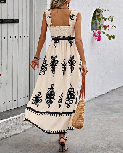 Dahlia - Elegante jurk met halternek en print