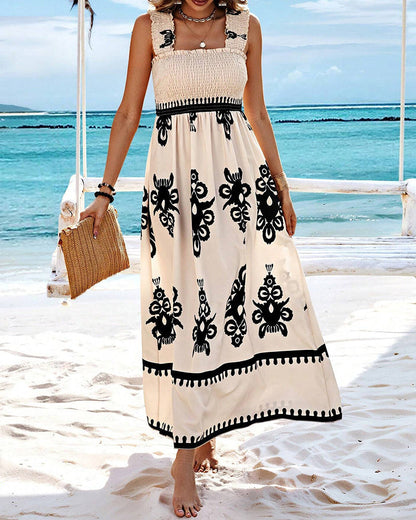 Dahlia - Elegante jurk met halternek en print